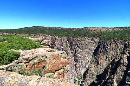 at the edge of a cliff